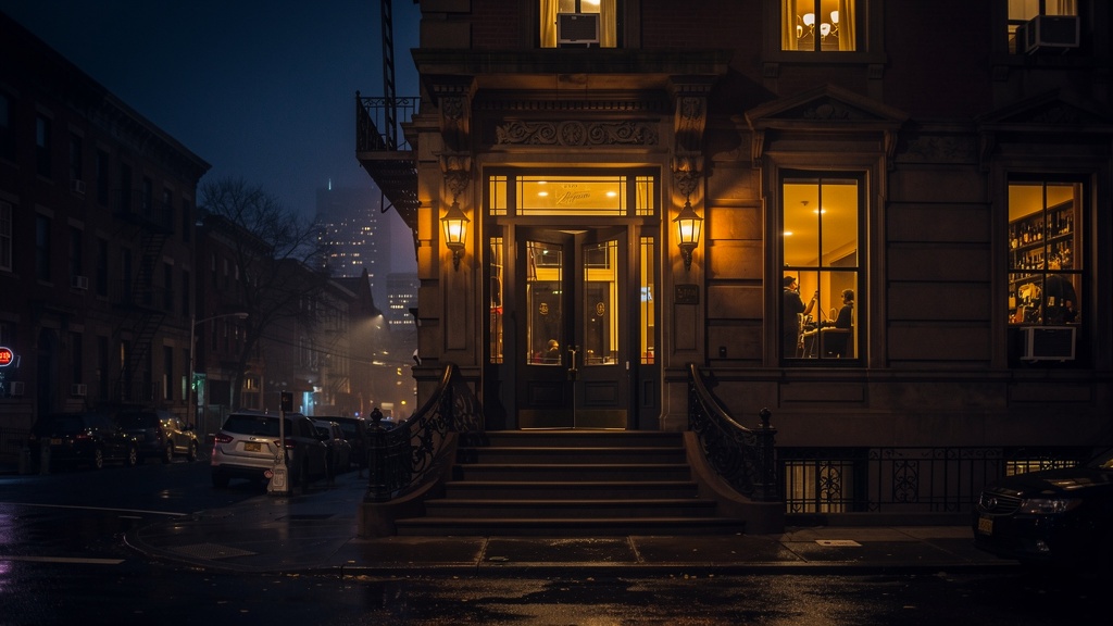 NAMA brownstone at night